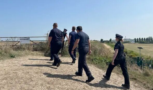 Police officers at the scene in the Leysdown-on-Sea resort on the Isle of Sheppey