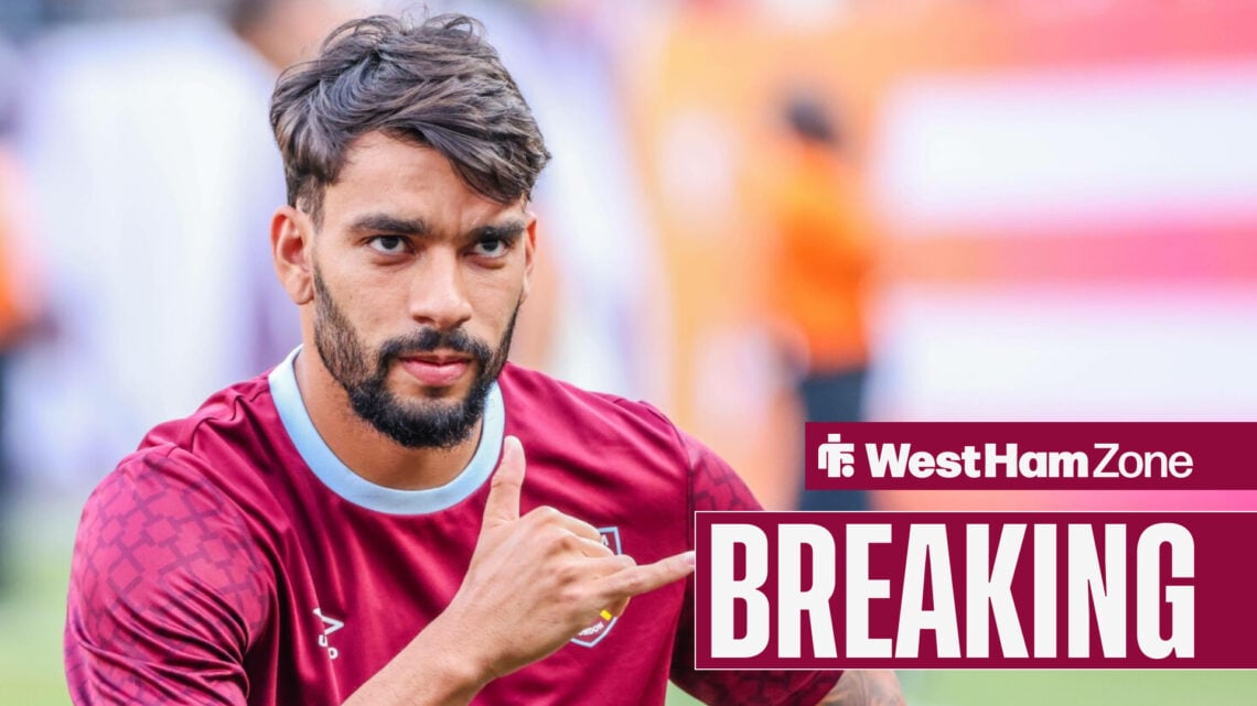 Lucas Paqueta does at hand gesture in his West Ham training kit.