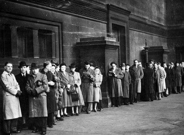 Crowds form outside St Georges Hall in Liverpool where the murder trial of George Kelly and Charles Connolly