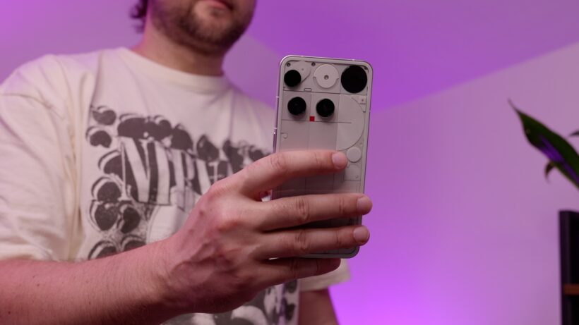 Nothing Phone 3 - in hand in background