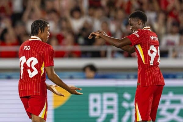 YOKOHAMA, JAPAN - Wednesday, July 30, 2025: Liverpool's Rio Ngumoha celebrates with team-mate Trey Nyoni (R) after scoring his side's third goal during the Meiji Yasuda J.League World Challenge 2025 match between Yokohama F. Marinos and Liverpool FC at the International Stadium Yokohama. (Photo by David Rawcliffe/Propaganda)