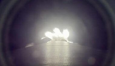 a downward-facing camera mounted on a rocket captures the booster's thrust as it climbs to space