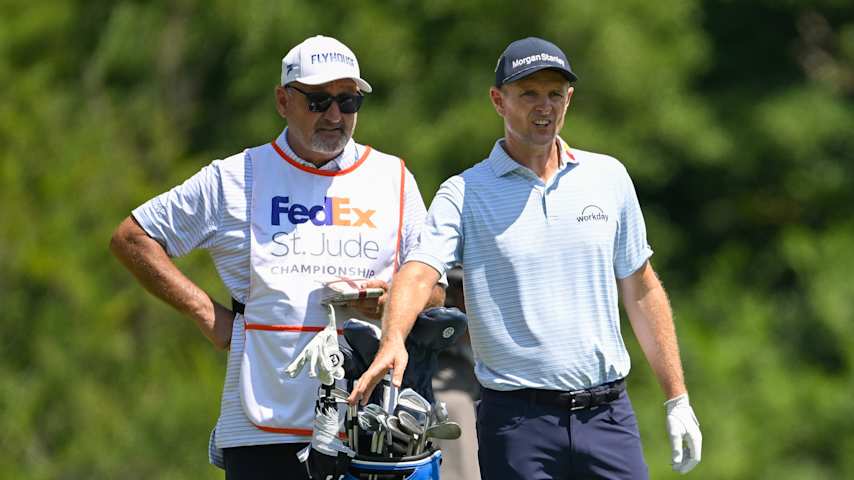 MEMPHIS, TENNESSEE - AUGUST 09: Justin Rose of England stands near his caddie and bag on the first hole during the third round of  FedEx St. Jude Championship at TPC Southwind on August 9, 2025 in Memphis, Tennessee. (Photo by Ben Jared/PGA TOUR via Getty Images)
