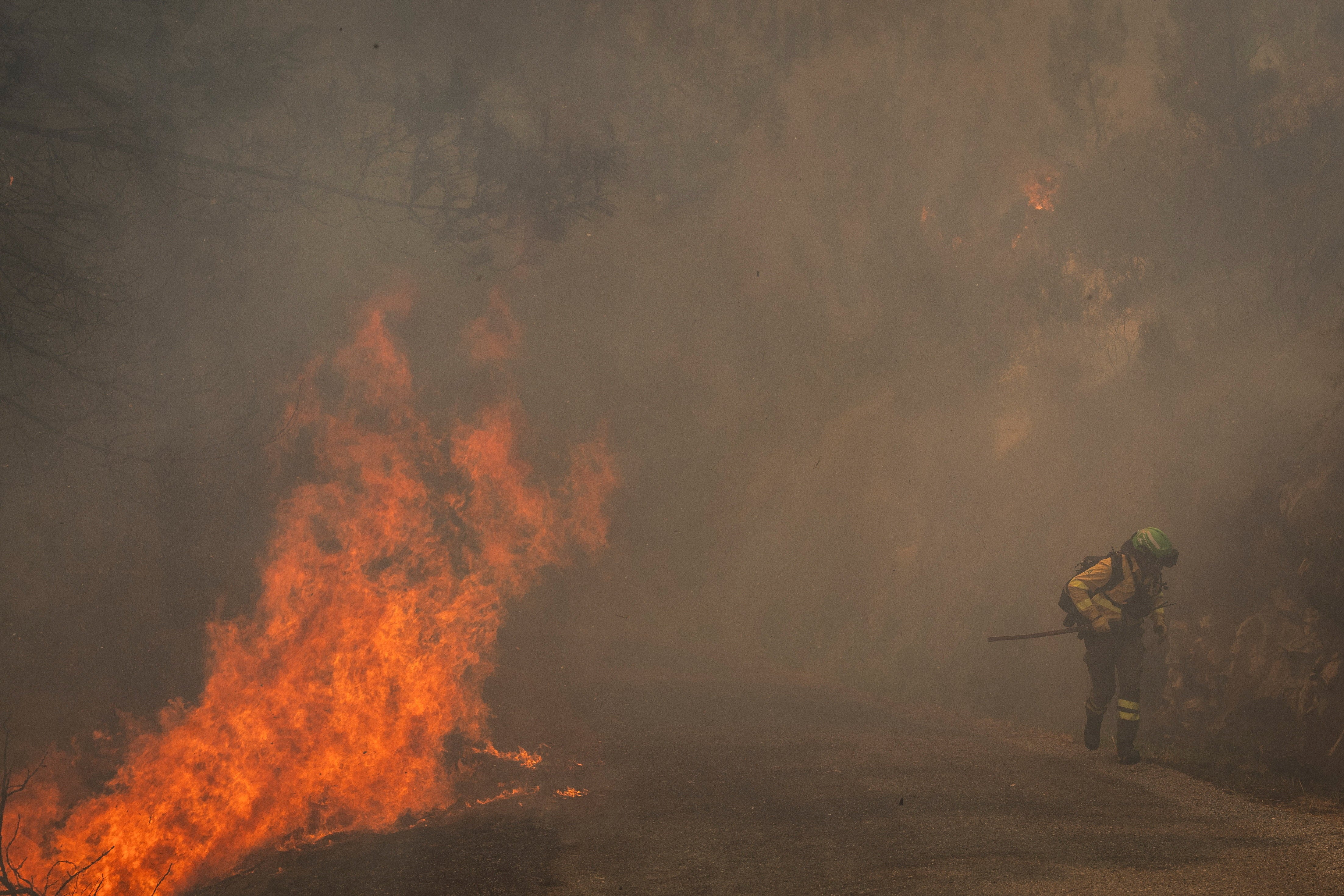 Four people have been killed as fires spread during the heatwave