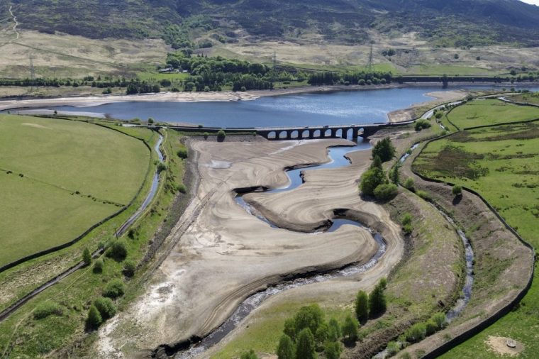 WOODHEAD, DERBYSHIRE - MAY 11: An aerial view of Woodhead Reservoir amid low water levels on May 11, 2025 in Derby, England. United Utilities, a water utility in north-west England, warned customers to consume less water as they announced that regional reservoirs were at 69% capacity. Last year at this time, reservoirs were at 90%. The utility said there was a 