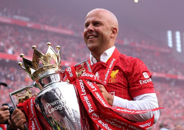 Soccer Football - Premier League - Liverpool v Crystal Palace - Anfield, Liverpool, Britain - May 25, 2025 Liverpool manager Arne Slot celebrates with the trophy after winning the Premier League REUTERS/Phil Noble EDITORIAL USE ONLY. NO USE WITH UNAUTHORIZED AUDIO, VIDEO, DATA, FIXTURE LISTS, CLUB/LEAGUE LOGOS OR 'LIVE' SERVICES. ONLINE IN-MATCH USE LIMITED TO 120 IMAGES, NO VIDEO EMULATION. NO USE IN BETTING, GAMES OR SINGLE CLUB/LEAGUE/PLAYER PUBLICATIONS. PLEASE CONTACT YOUR ACCOUNT REPRESENTATIVE FOR FURTHER DETAILS..