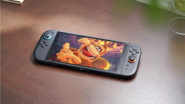 Nintendo Switch 2 lying on table while displaying Donkey Kong screaming