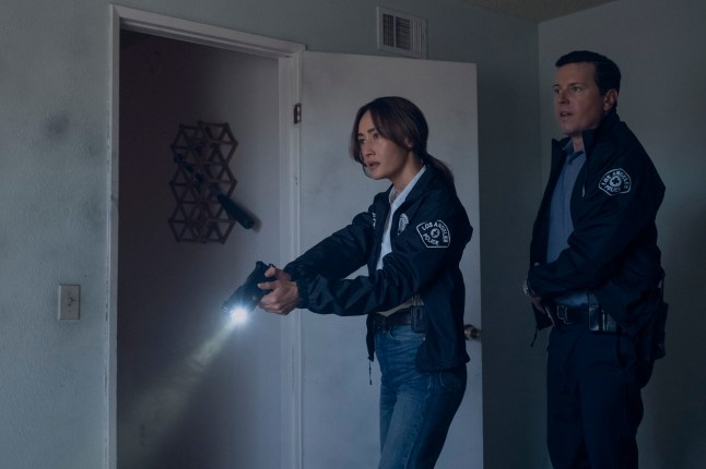 This image released by Amazon Prime shows Maggie Q and Michael Mosley in a scene from the series 