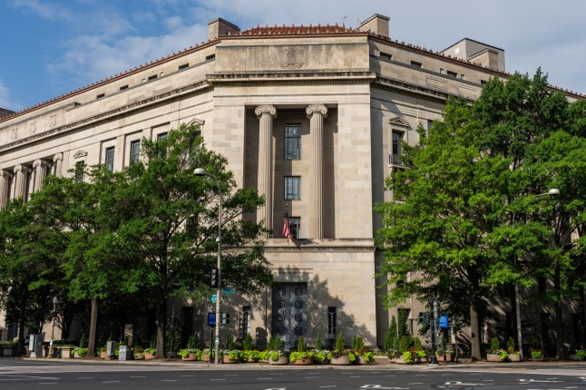WASHINGTON, DC - JULY 20: The Department of Justice building on July 20, 2025 in Washington, DC. Attorney General Pam Bondi has asked a federal judge to unseal grand jury testimony used in the prosecution of Jeffrey Epstein and his longtime associate Ghislaine Maxwell. (Photo by Eric Lee/Getty Images)