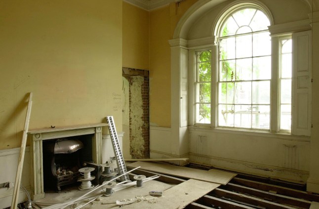 The front reception room of the Grade II-listed Forest Lodge, in Windsor Great Park, Berkshire, a Georgian mansion once admired by both King George IV and King Edward VIII which will soon be available for rent it was announced. *...The 8 bedroomed house is currently undergoing 1.5 million restoration work to retain its fine period detail but will be ready for occupation in the autumn for 15,000 a month. It features original stonework, elaborate plaster cornices and ceiling decoration, exquisite marble fireplaces, Venetian windows and a half-barrel vaulted hallway ceiling and is worth an estimated 5.5 million.