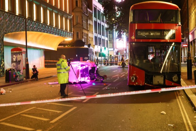 Three people are fighting for their lives after a rickshaw collided with a London bus in the heart of the West End during the early hours of the Bank Holiday Monday. Victims Rushed to Major Trauma Centres The crash happened on Charing Cross Road, WC2, shortly after midnight. The rickshaw rider and two passengers sustained critical injuries and were treated at the roadside for some time by police officers and paramedics before being rushed to major trauma centres in central London. Rickshaw Rider and Two Passengers Fighting for Their Lives After Collision with London Bus in Charing Cross Police confirmed that officers remain with the injured parties at hospital. Rickshaw Rider and Two Passengers Fighting for Their Lives After Collision with London Bus in Charing Cross Full Collision Investigation Specialist officers from the Metropolitan Police Alperton Traffic Garage and the Forensic Collision Investigation Unit are leading enquiries. A full collision reconstruction is underway at the scene. Rickshaw Rider and Two Passengers Fighting for Their Lives After Collision with London Bus in Charing Cross The road remains closed, with diversions affecting night bus routes N29, N20, N5, N279 and 24 towards Trafalgar Square. The closure is expected to continue for several hours. Awaiting Official Updates The Metropolitan Police and London Ambulance Service have been approached for an official statement but have not yet released further details on the victims??? conditions. Rickshaw Rider and Two Passengers Fighting for Their Lives After Collision with London Bus in Charing Cross A Met?? Police source at the Scene said: ???Our specialist collision investigators are working to establish the full circumstances of this very serious incident. We continue to appeal to anyone who may have witnessed the collision, or has dashcam or CCTV footage, to come forward.???