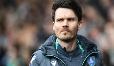 Danny Rohl looks on with a concerned face as he watches his Sheffield Wednesday side in action