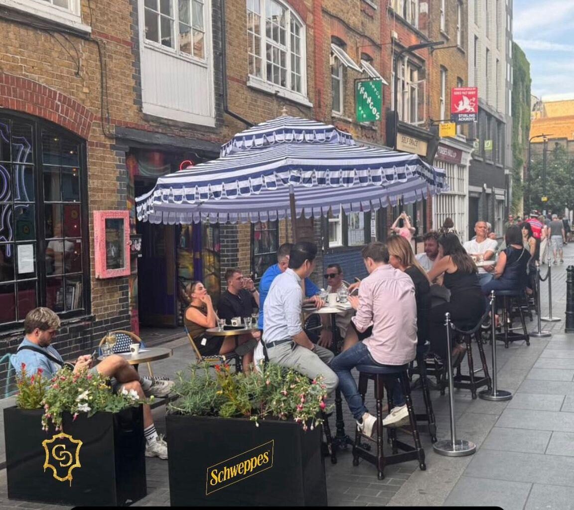 Sadiq Khan's al fresco dining scheme launches in Shoreditch - but will showers spoil the party?