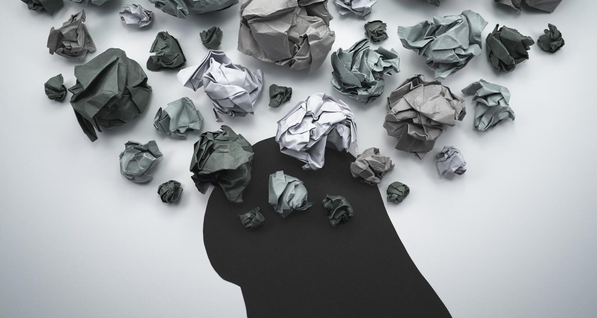 Stressed Person Silhouette Crumpled Paper