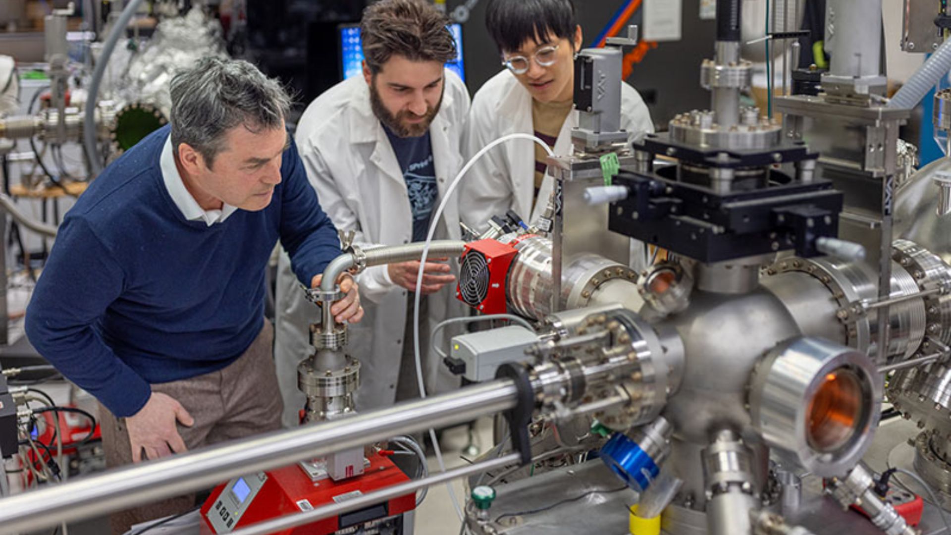 Research team with the instrument setup