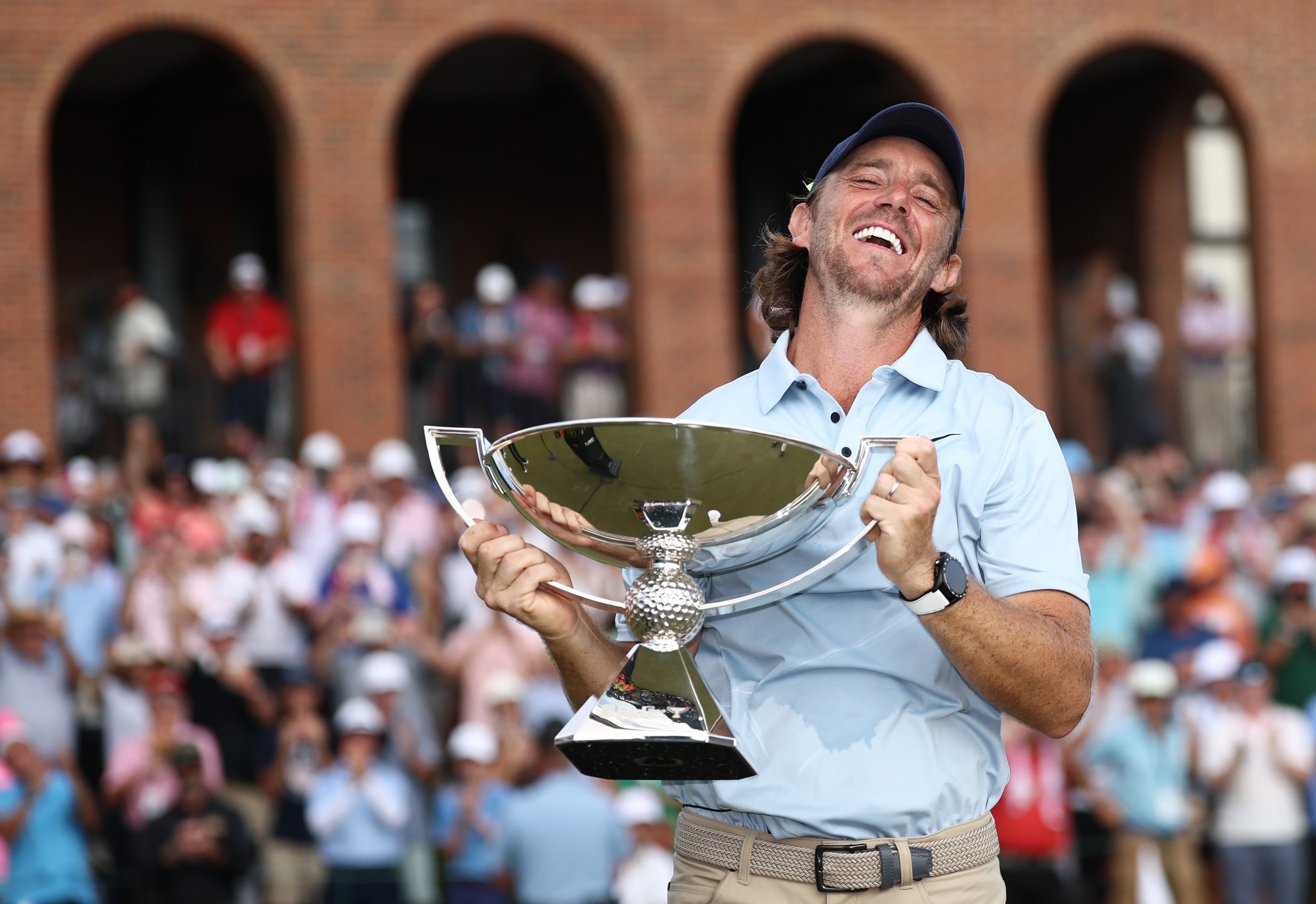 Fleetwood celebrates with the Fedex Cup trophy