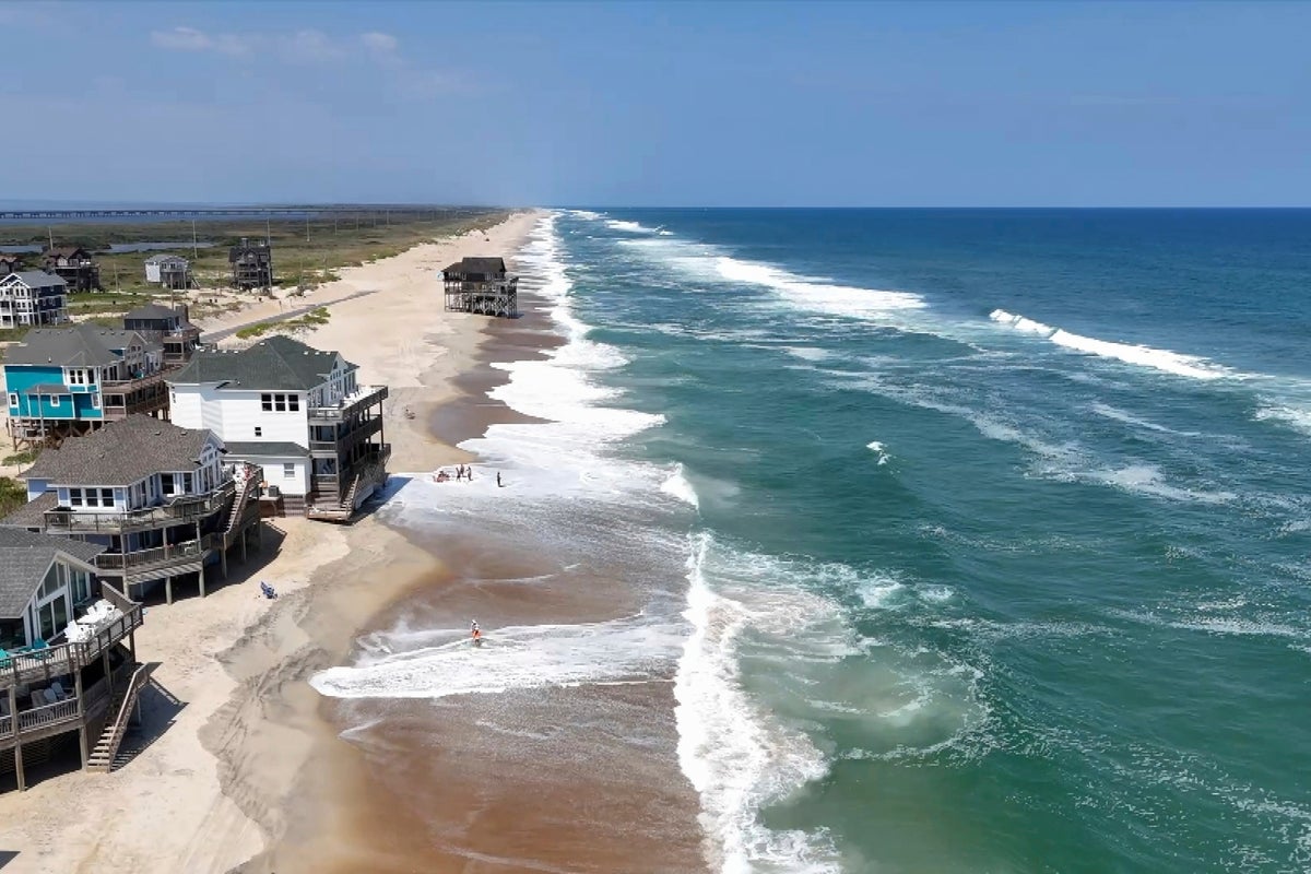 Summer celebrations meet closed beaches and warnings on US East Coast due to Hurricane Erin
