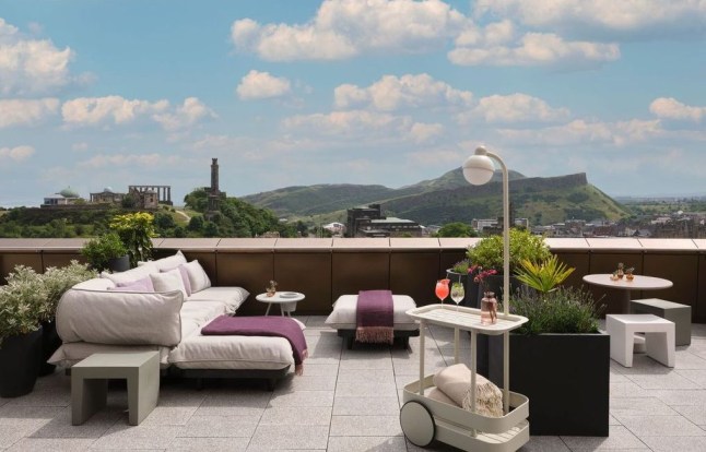 A view over Edinburgh's hills from the W Edinburgh rooftop bar, on a bright day.