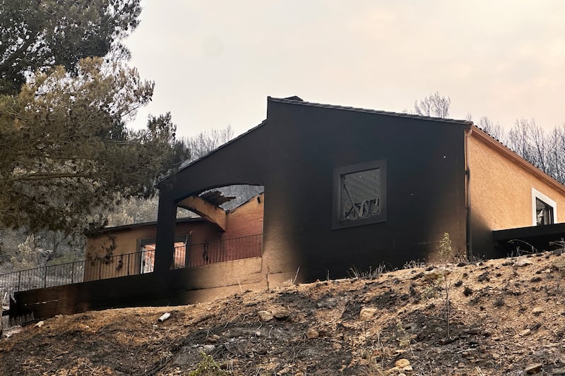 A burned house near Durban-Corbières, southern France. Photograph: Hernan Munoz/AP
