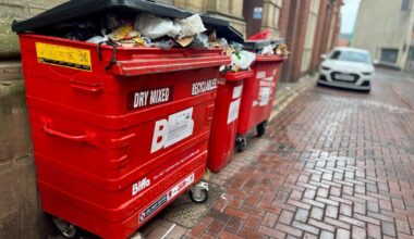 Why are so many streets cluttered with overflowing bins?