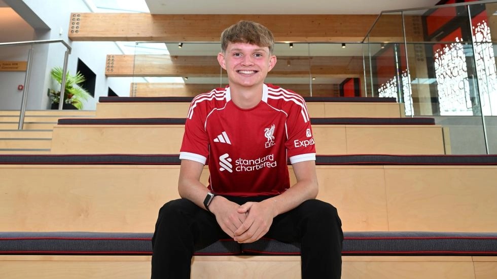Will Wright after signing for Liverpool (Photo via LiverpoolFC.com)