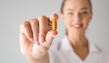 Woman Holding Vitamin Supplement Pill