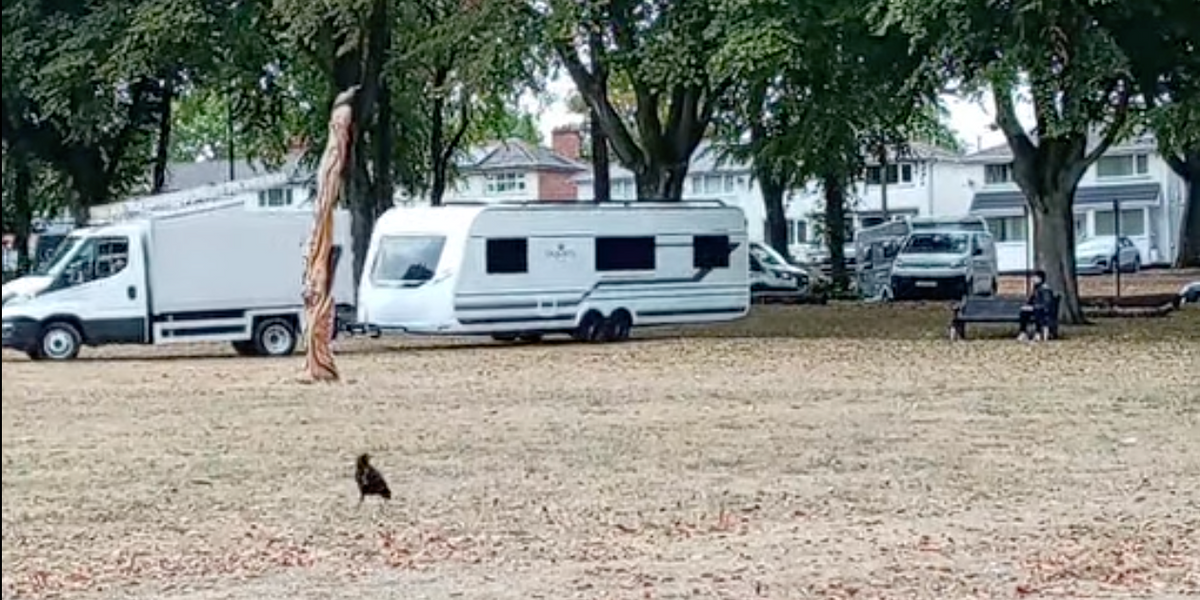 Travellers return to picturesque park despite council installing barriers to stop caravans