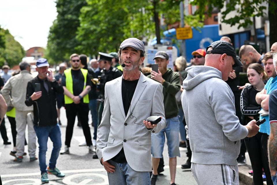 Several dozen anti asylum seeker  protestors gathered outside a Belfast hotel. Photo by  Press Eye.