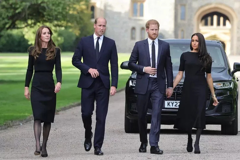Catherine, Princess of Wales, Prince William, Prince of Wales, Prince Harry, Duke of Sussex, and Meghan, Duchess of Sussex on the long Walk at Windsor Castle arrive to view flowers and tributes to HM Queen Elizabeth on September 10, 2022 in Windsor, England.