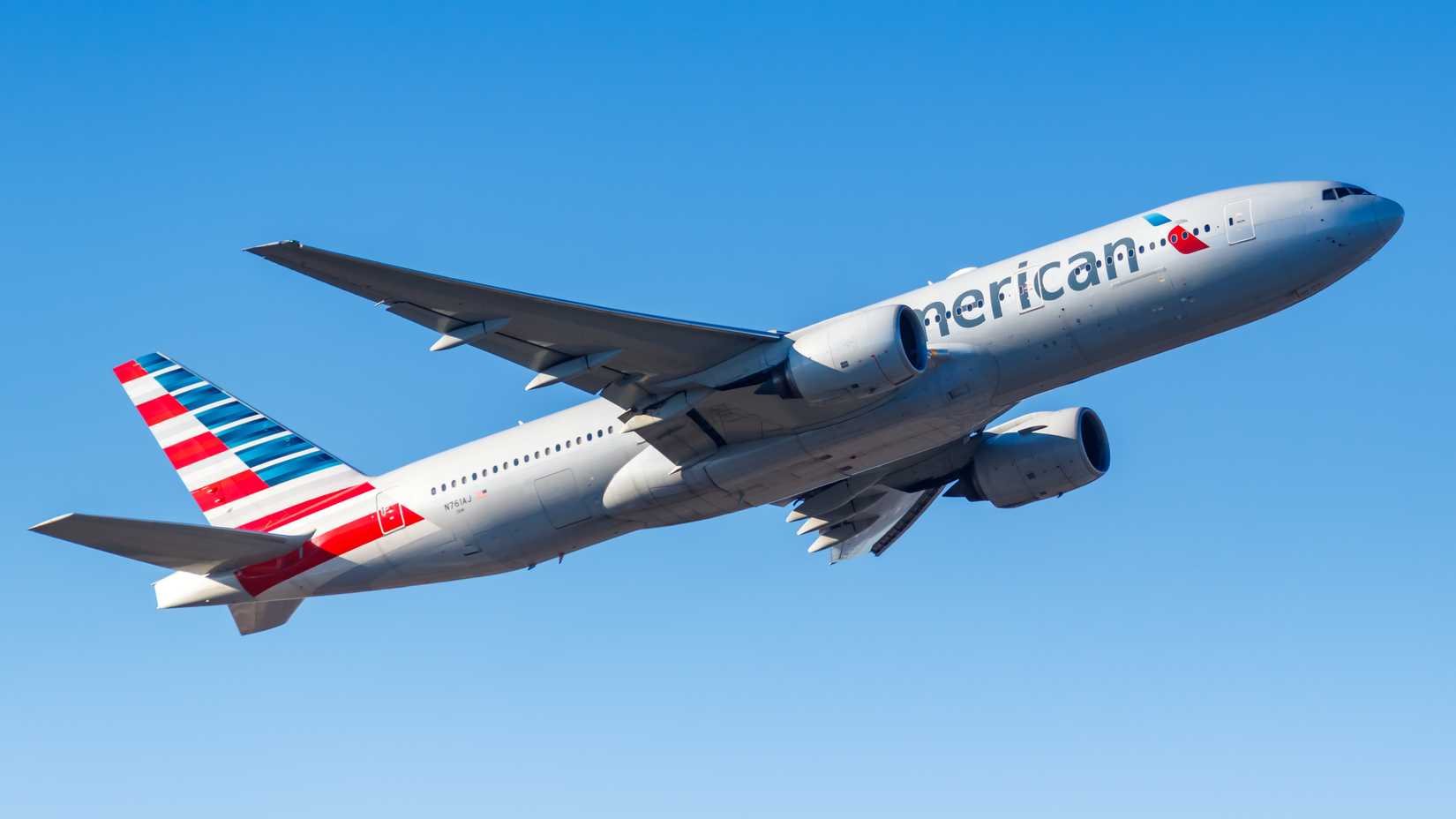 American Airlines Boeing 777-300ER departing shutterstock_1918656806