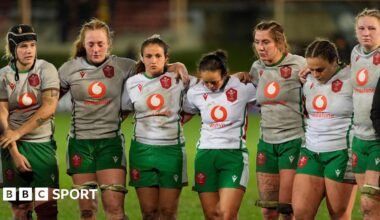 Wales players look dejected in defeat
