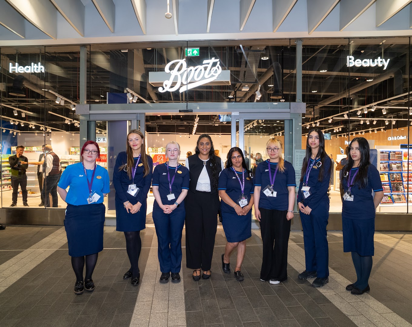 Boots team members outside the new Boots Birmingham New Street store