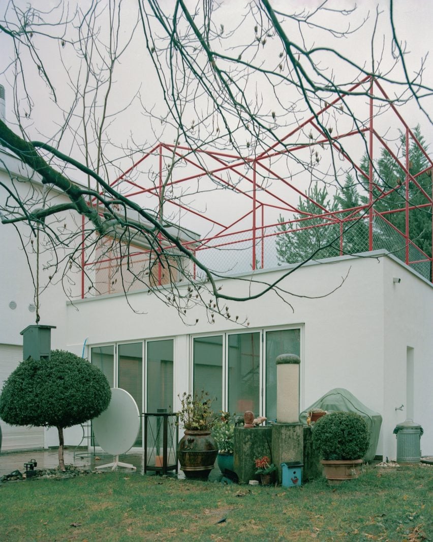 Geometric red steel pergola 