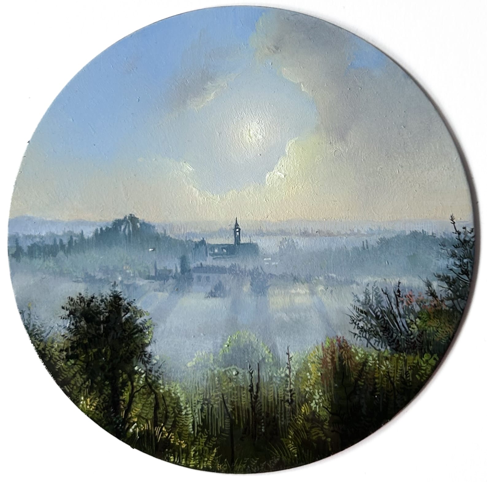 a tiny painting of Siena, Italy, at sunrise