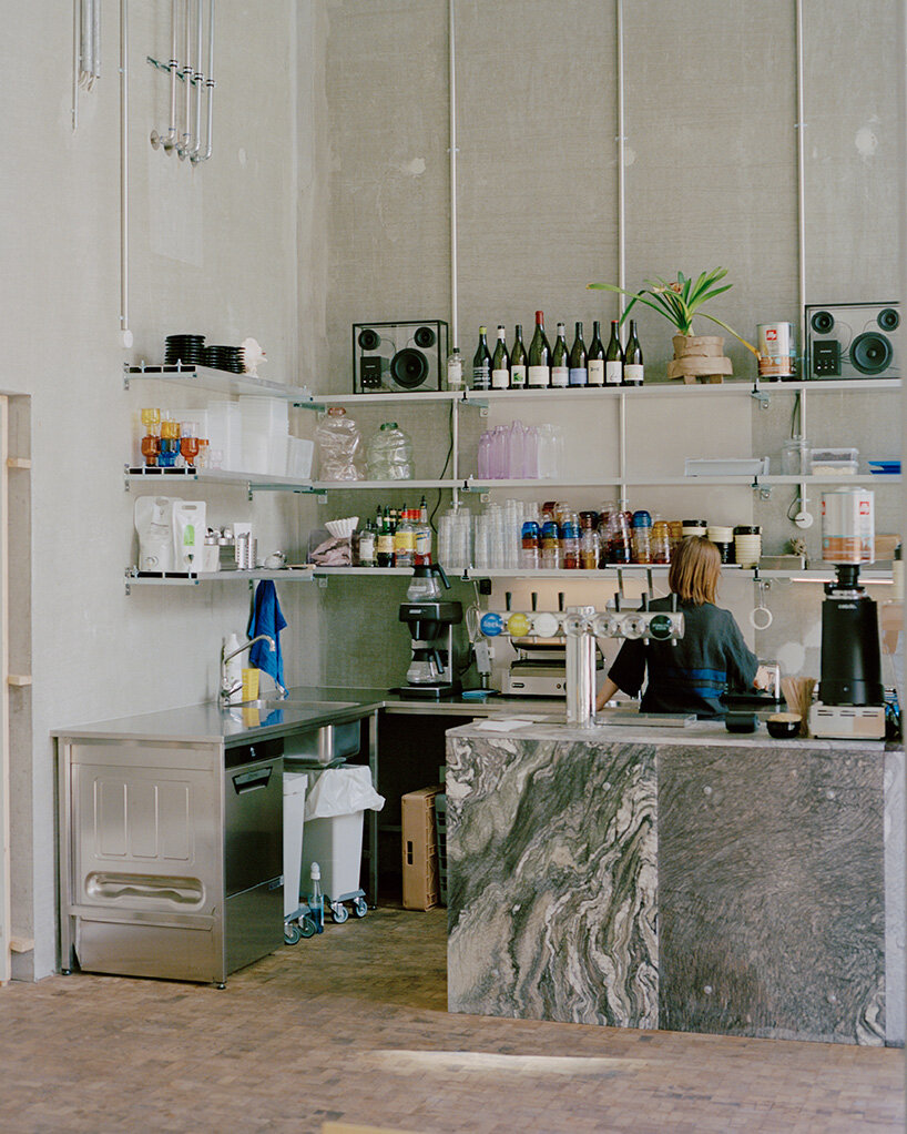 café by kim lenschow and NIKO JUNE doubles as design shop on copenhagen's waterfront