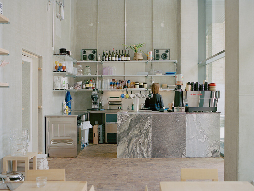 café by kim lenschow and NIKO JUNE doubles as design shop on copenhagen's waterfront