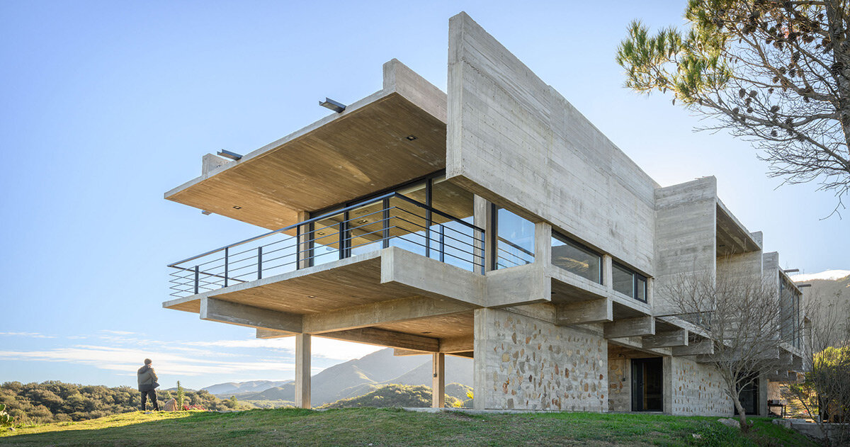 cristian nanzer’s el dragón house rises from cyclopean stone base