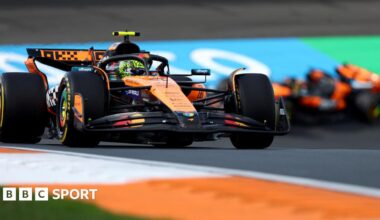McLaren's Lando Norris in Dutch Grand Prix first practice with team-mate taking a corner in the background