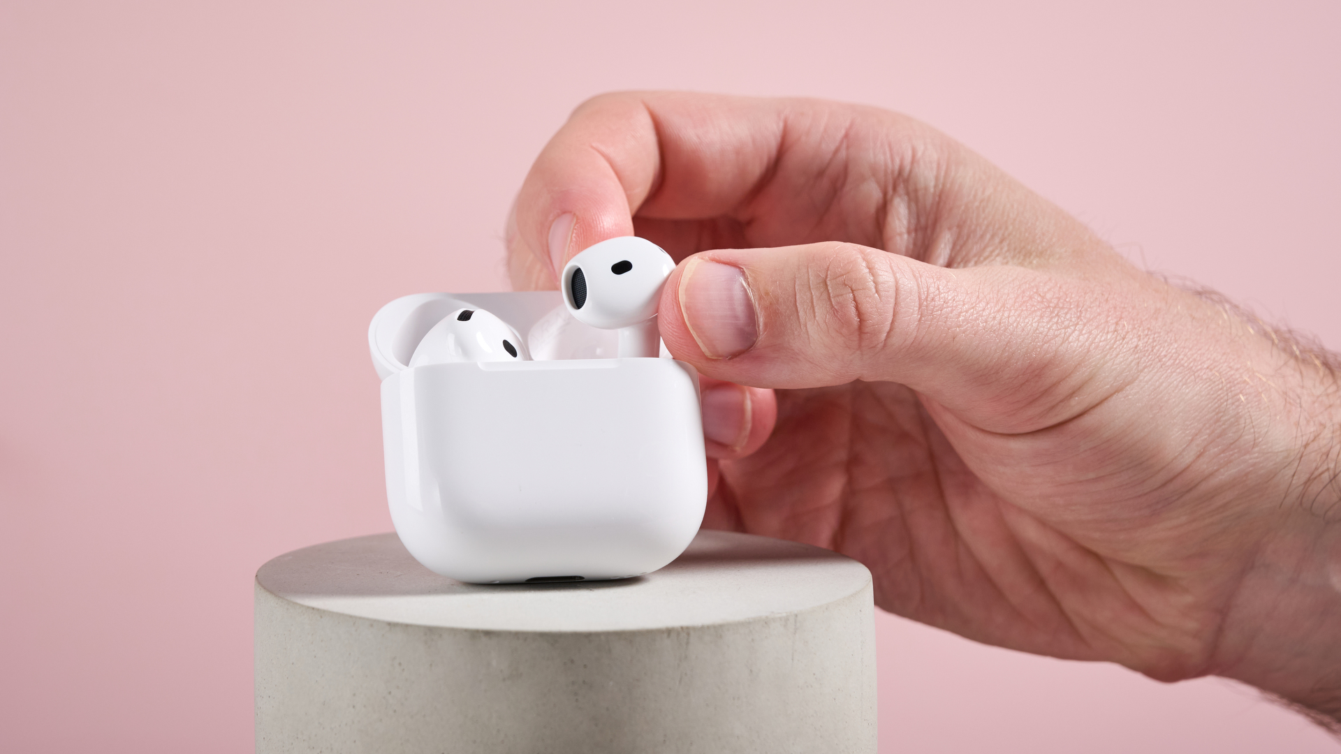 AirPods 4 with Active Noise Cancellation being taken out of their case