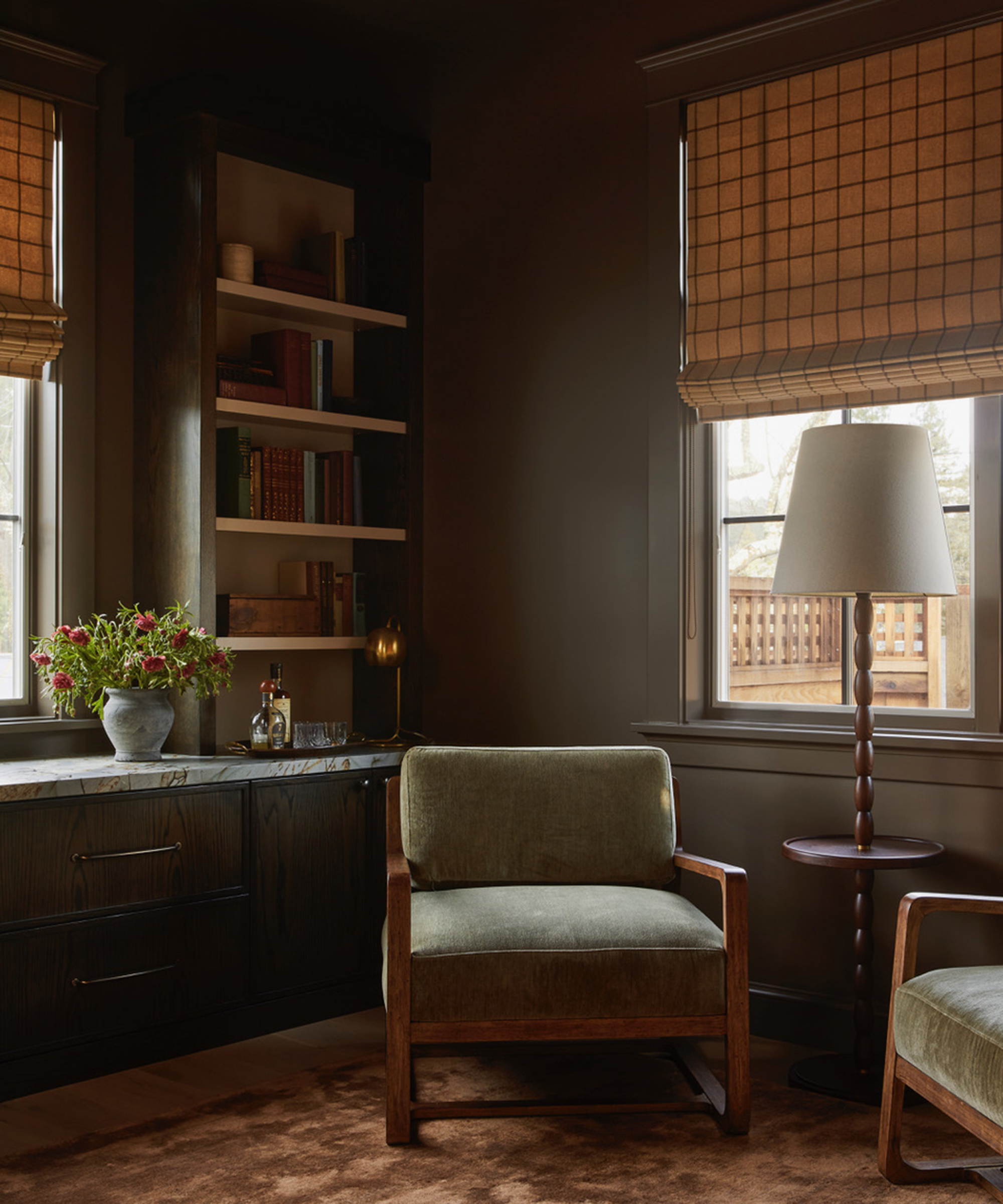 living room with brown walls