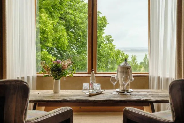 Alex Crétey Systermans A view of the Seine from a suite at Ferme Saint Siméon.