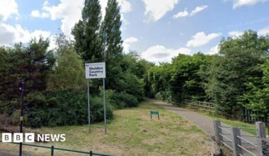 A google street view image of a park with a large sign that says Sheldon Country Park
