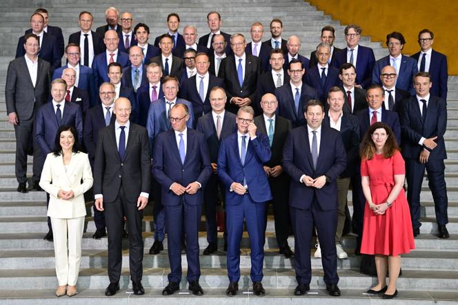 German Chancellor Friedrich Merz, cabinet ministers, and top German executives attend the launch of the 'Made for Germany' initiative at the chancellery in Berlin on July 21, 2025.