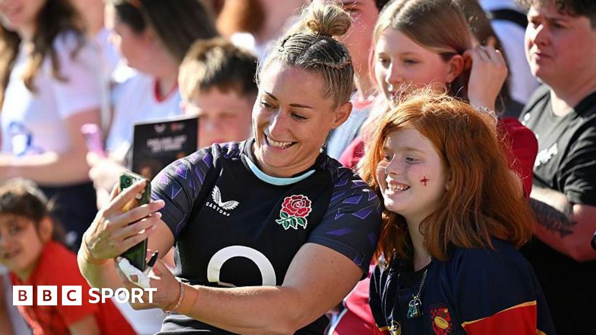 England's Natasha Hunt takes a selfie with a fan