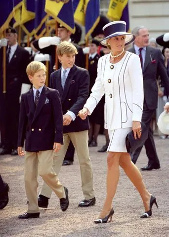 Antony Jones/Julian Parker/UK Press via Getty Images Princess Diana with Prince William and Prince Harry in August 1995