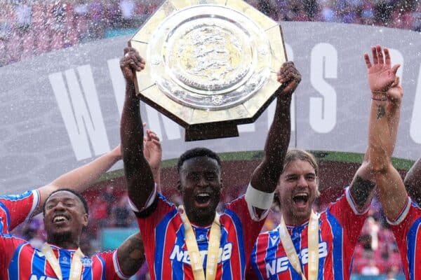 Crystal Palace’s Marc Guehi lifts the Community Shield with team-mates (John Walton/PA)