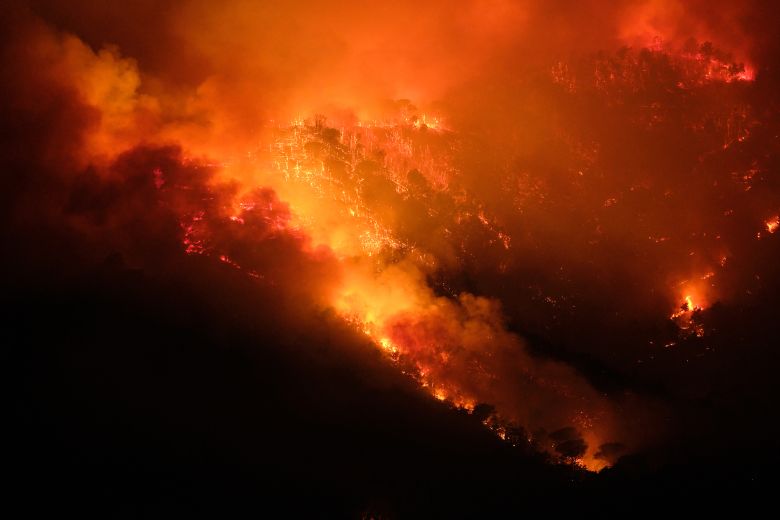 Flames and smoke from a wildfire at the Vesuvius National Park in Terzigno, a commune in Naples, Italy on August 8, 2025.