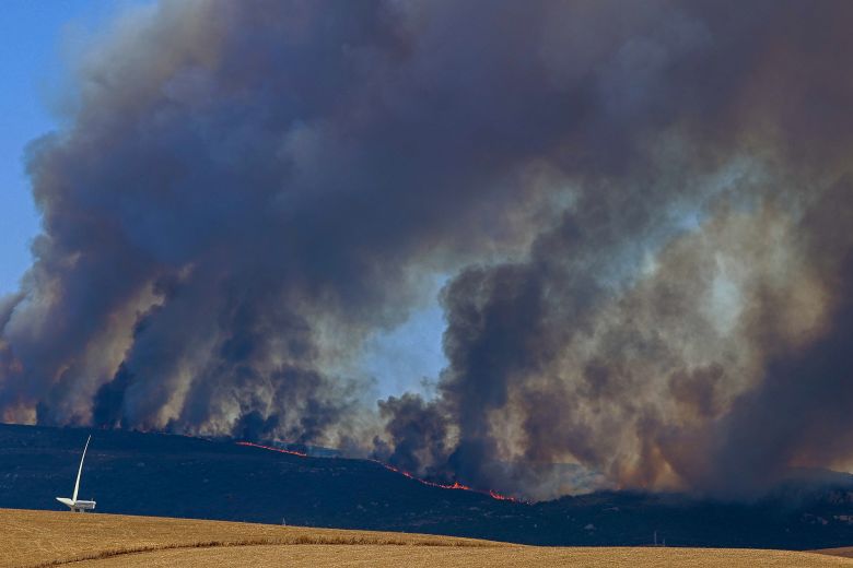 A fire blazing in the popular tourist hot spot of Tarifa, Spain on August 11, 2025.