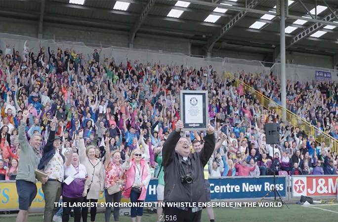 Craig with the tin whistle record certificate