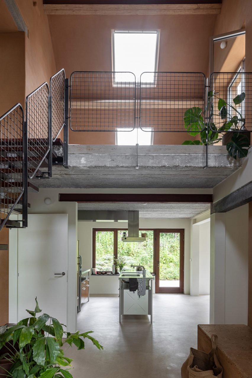View towards living spaces within the Omloop Farmhouse by Hé!
